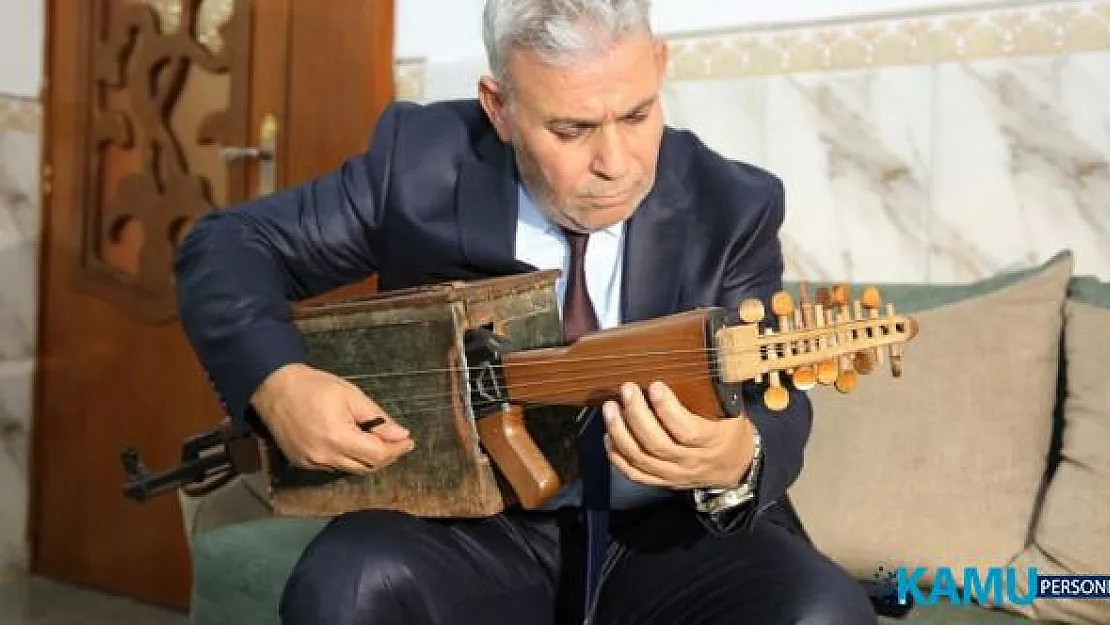 Iraklı müzik öğretmeni kalaşnikoftan telli çalgı yaptı! "Şiddetin değil müziğin sesi duyulsun diye"