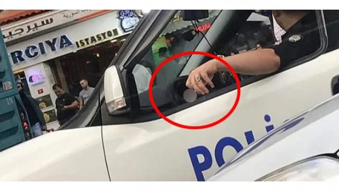 Resmi Araçta Telefonla Konuşup Sigara İçen Polis Memuruna Soruşturma Başlatıldı!